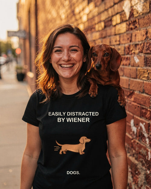 Person wearing the Easily Distracted by Wiener Dogs T-shirt