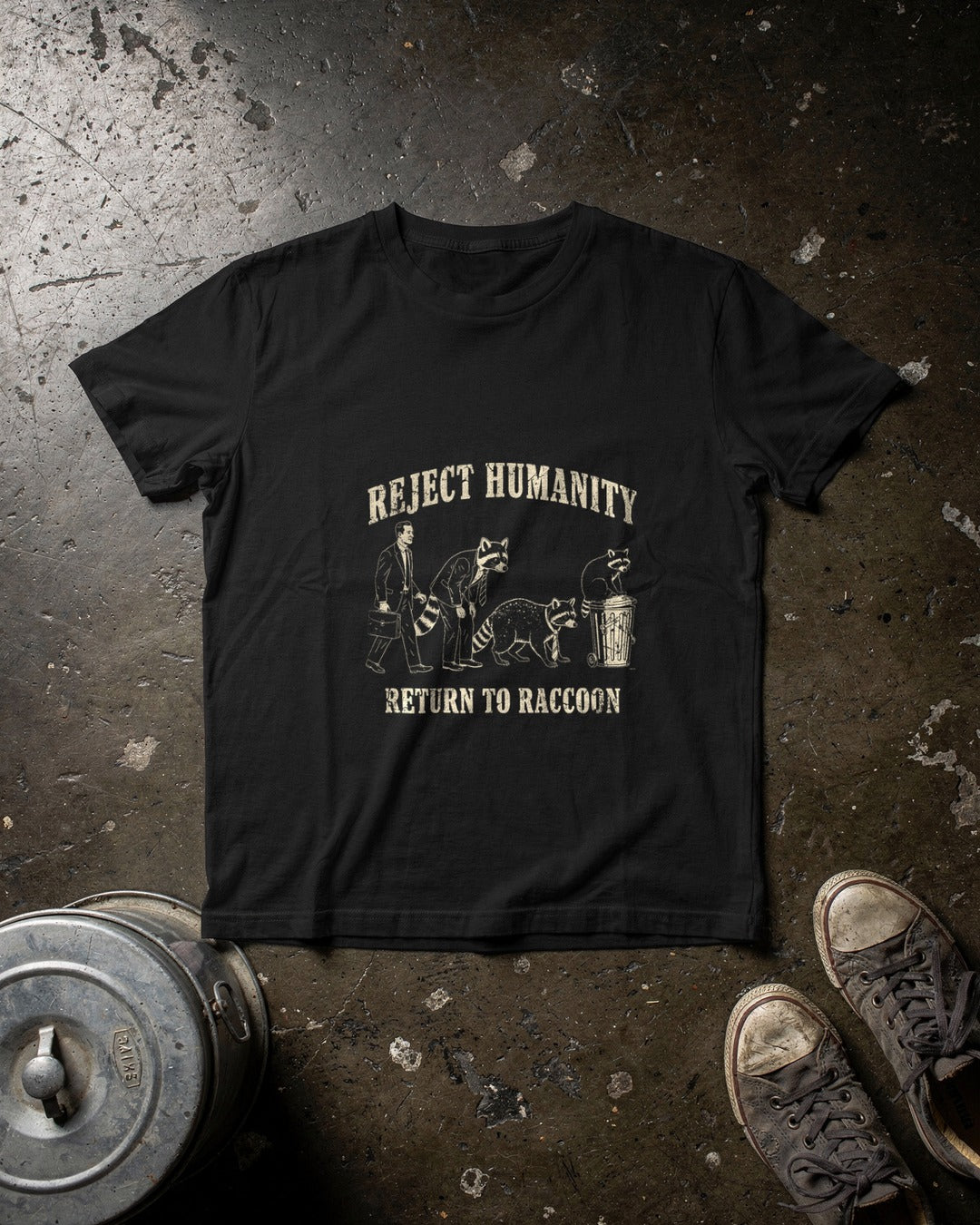 Reject Humanity, Return to Raccoon T-shirt flat lay