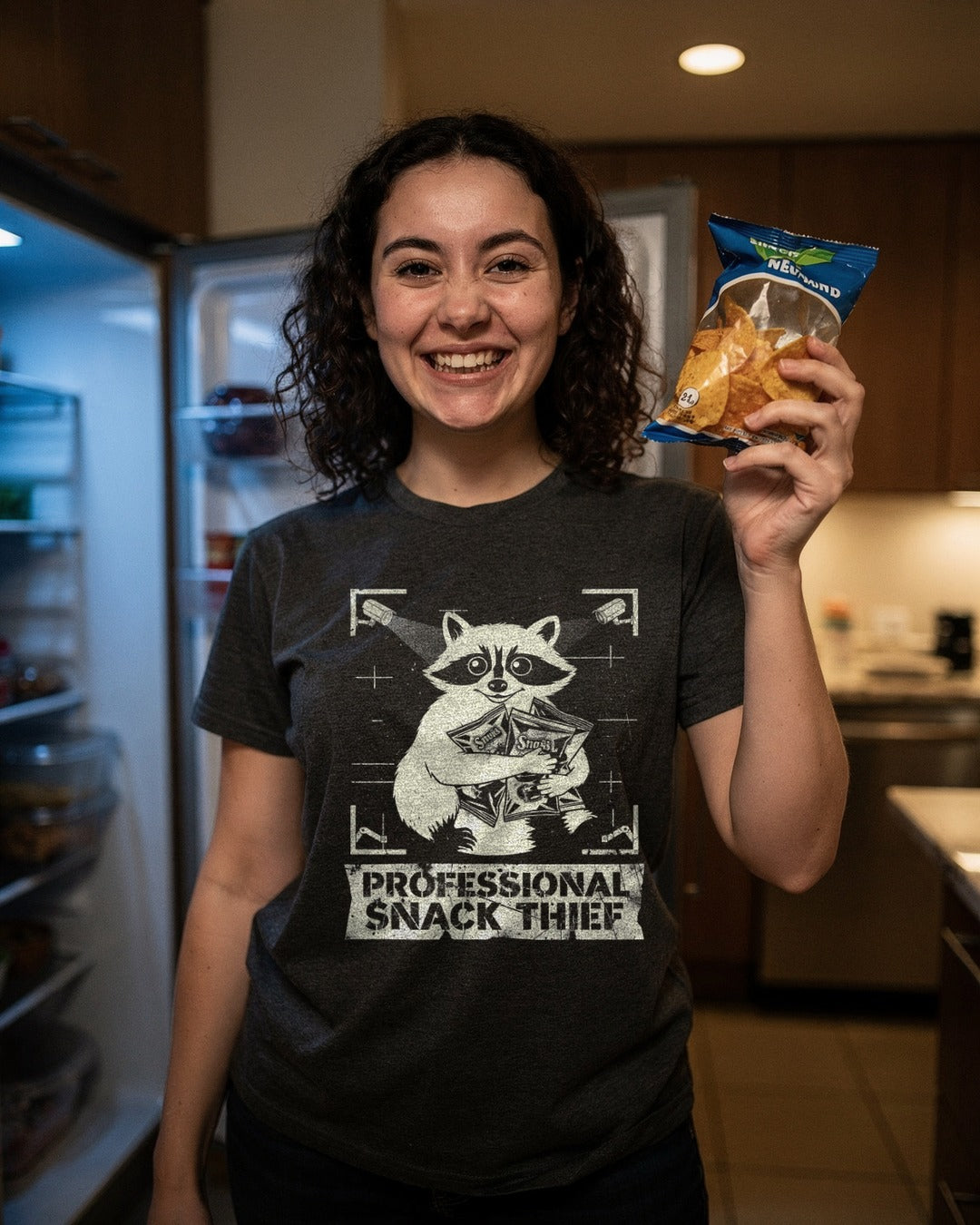 Person wearing the Professional Snack Thief Raccoon T-shirt